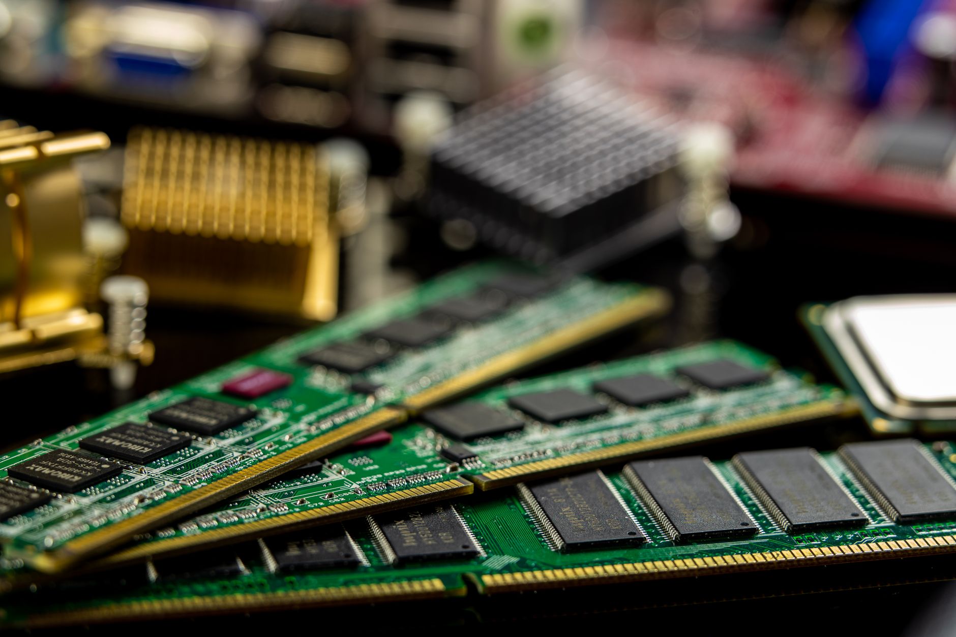 Close-up photograph of installed memory hardware and heat sinks on a computer motherboard.