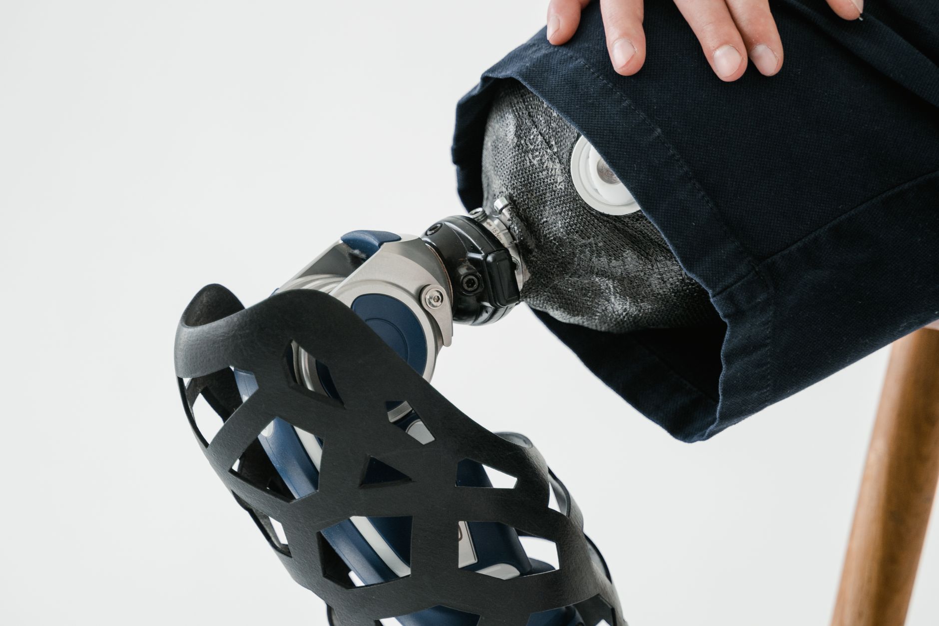 Person wearing a lower-limb exoskeleton outdoors