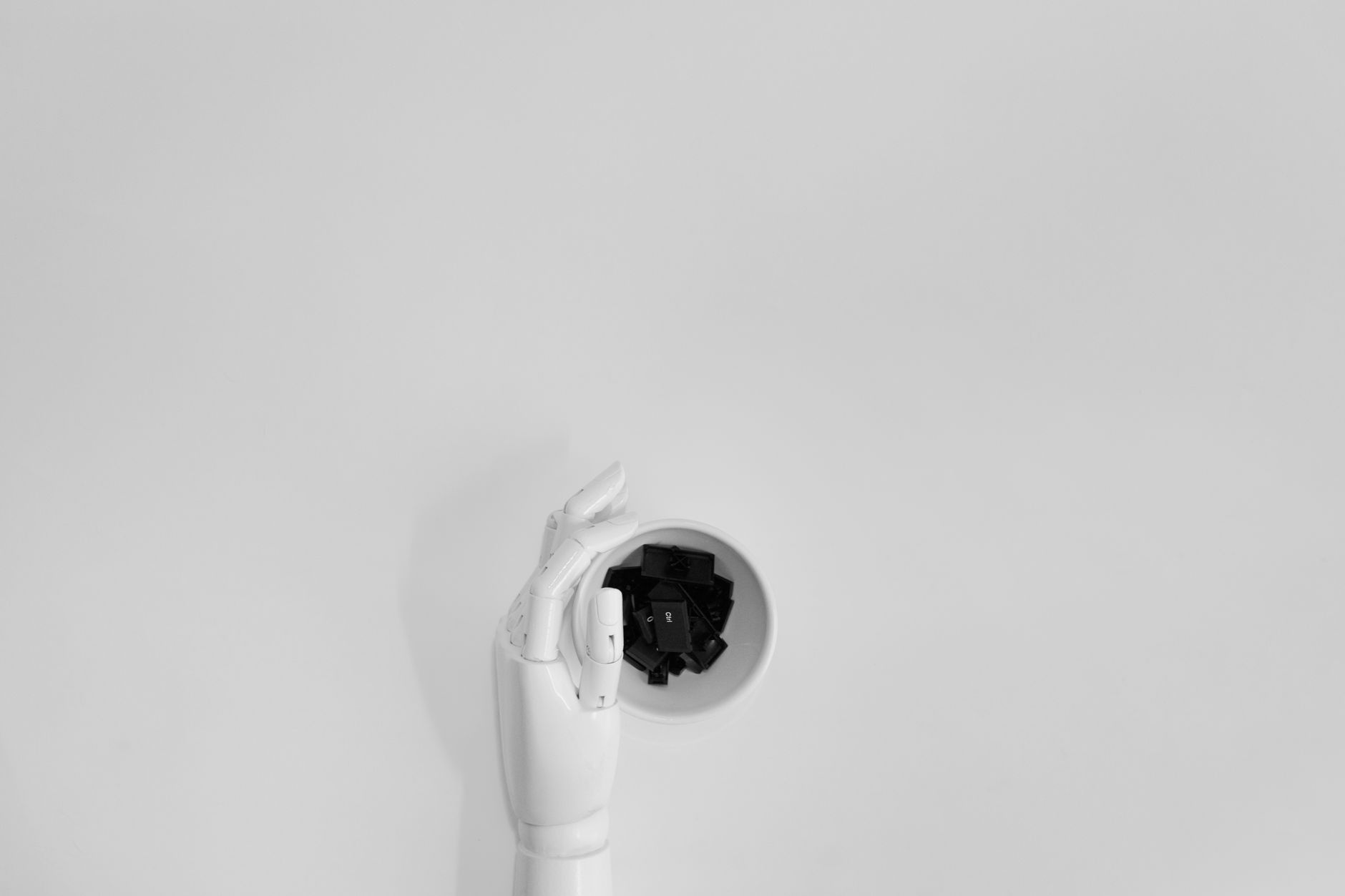 Robot hand grasping a block in a work scene